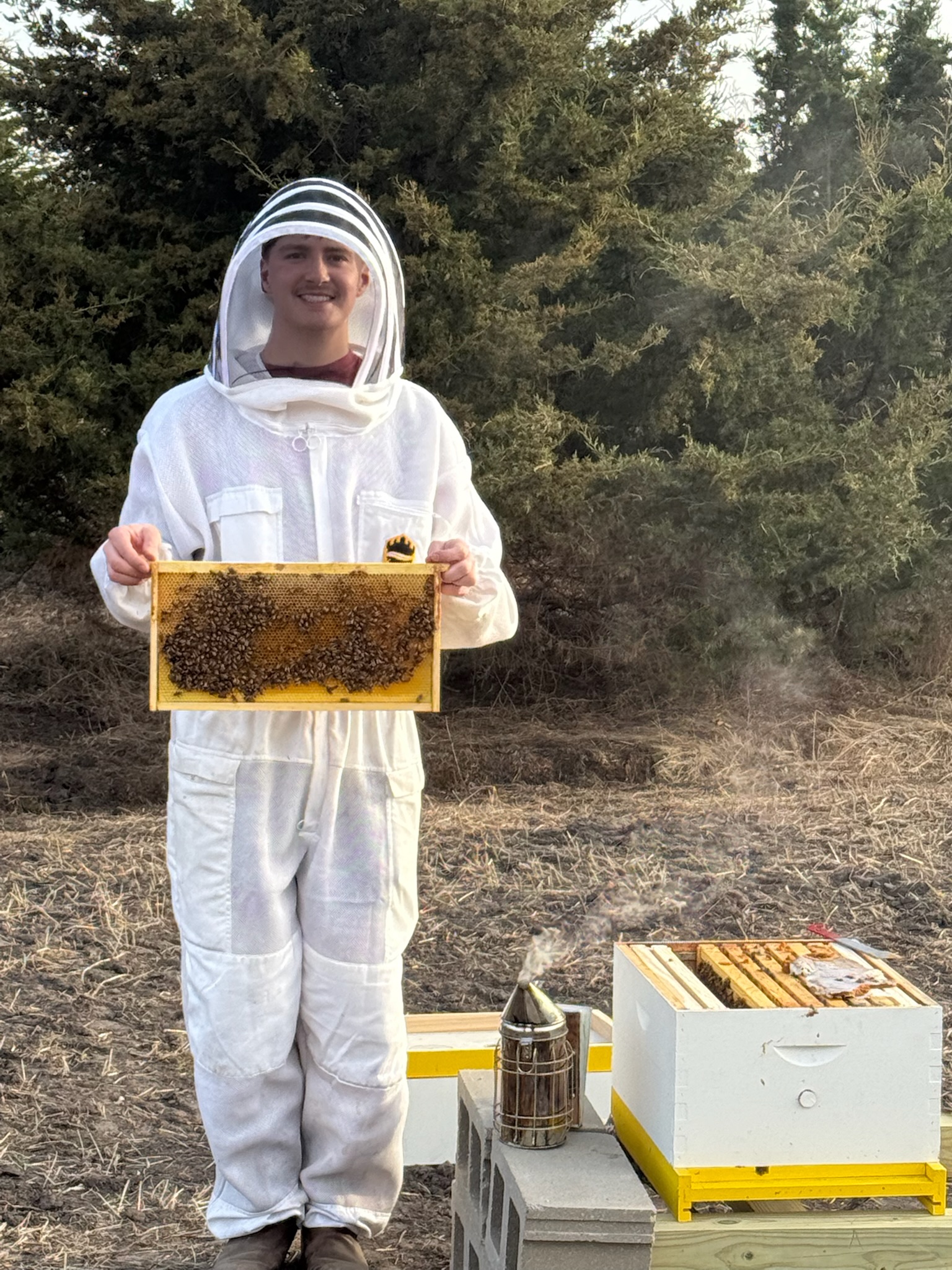 Connor holding a honeycomb frame